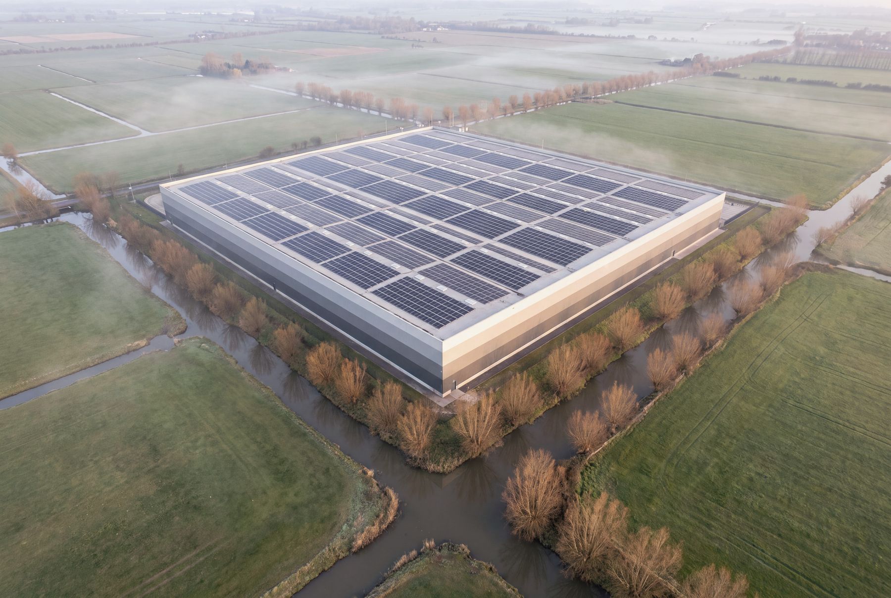Aerial view of the Huntworth distribution centre roof covered in solar panels